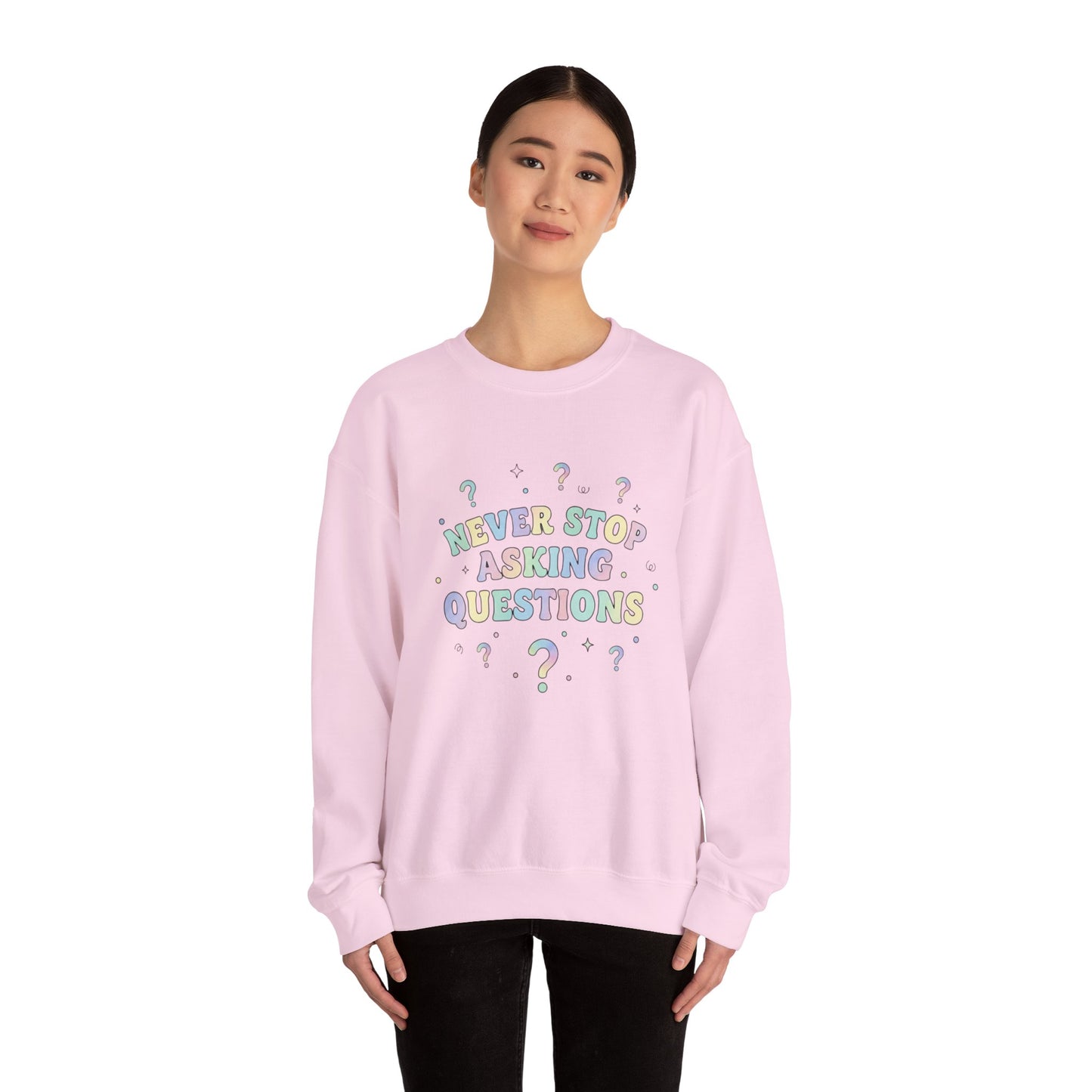 Crewneck Sweatshirt — "Never Stop Asking Questions" Pastel Graphic