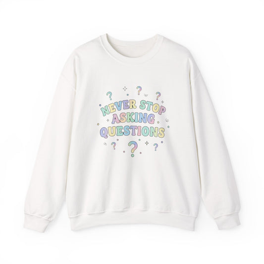 Crewneck Sweatshirt — "Never Stop Asking Questions" Pastel Graphic
